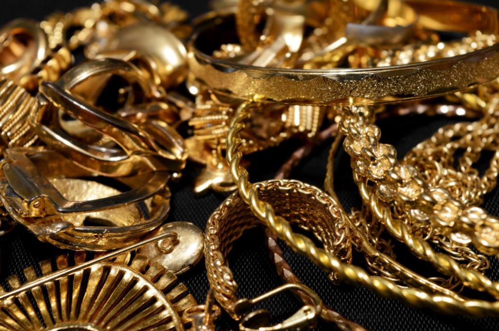 Broken gold jewelry pieces and scrap gold items
