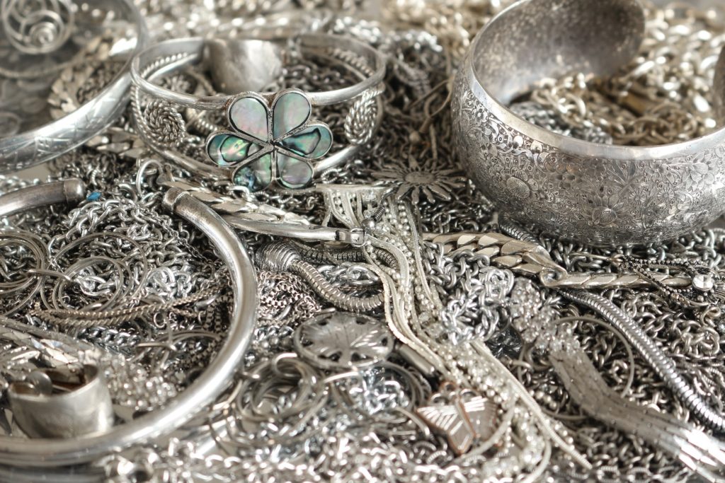 A close up of various silver items
