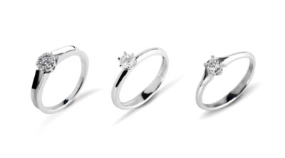Three wedding rings isolated on white background.