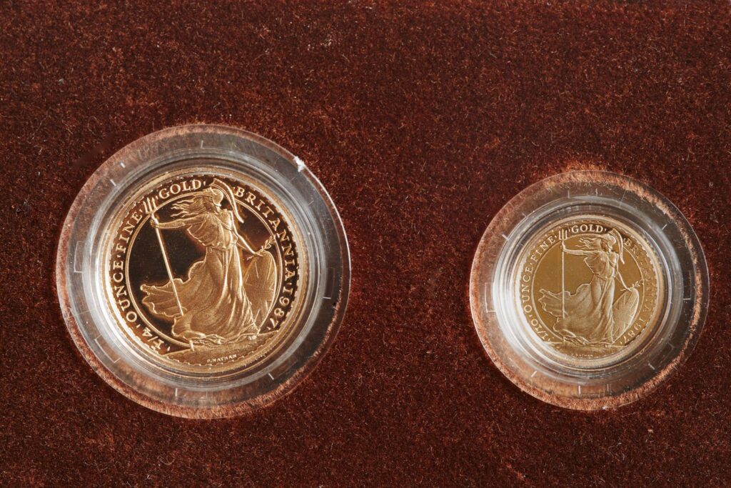 Gold British Britannia coin front and back view.
