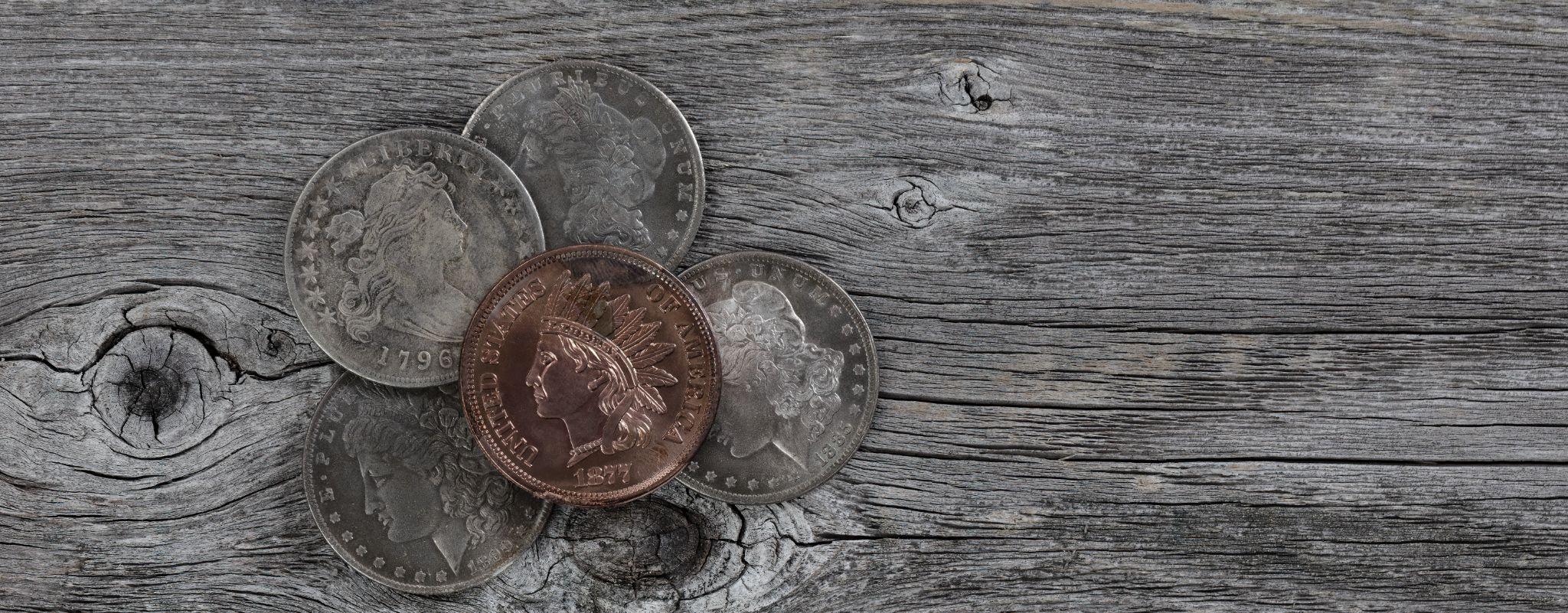 USA vintage coins on rustic wood in a close up view.